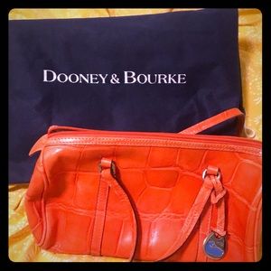EUC Dooney & Bourke orange purse GUARANTEED AUTH.